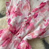 Rochie Brea roz cu nasturi imbracati si imprimeu floral