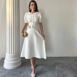 Rochie Eseld cu nasturi decoratisi decolteu petrecut