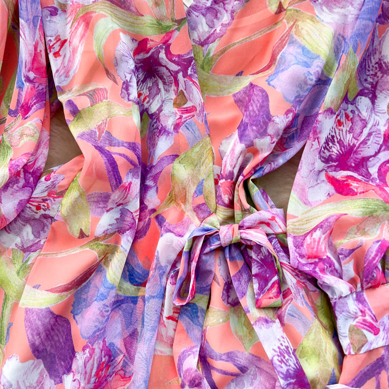 Rochie Gina portocalie cu decolteu in V si imprimeu floral