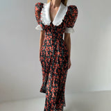 Rochie midi Solita negru din voal cu guler lat in V, maneci scurte, imprimeu floral