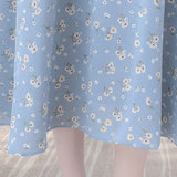 Rochie Silvy albastra cu imprimeu floral si decolteu accesorizat cu nod