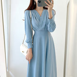 Rochie midi Fosetta albastra cu decolteu petrecut