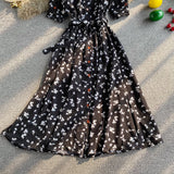 Rochie Arcelia neagra cu imprimeu floral si cordon accesorizat