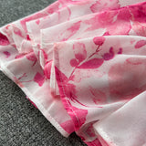 Rochie Brea roz cu nasturi imbracati si imprimeu floral