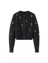 Jerseu Clio cu accesorii din pene si paiete