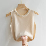 Top Kaelis din tricot cu perle la baza decolteului