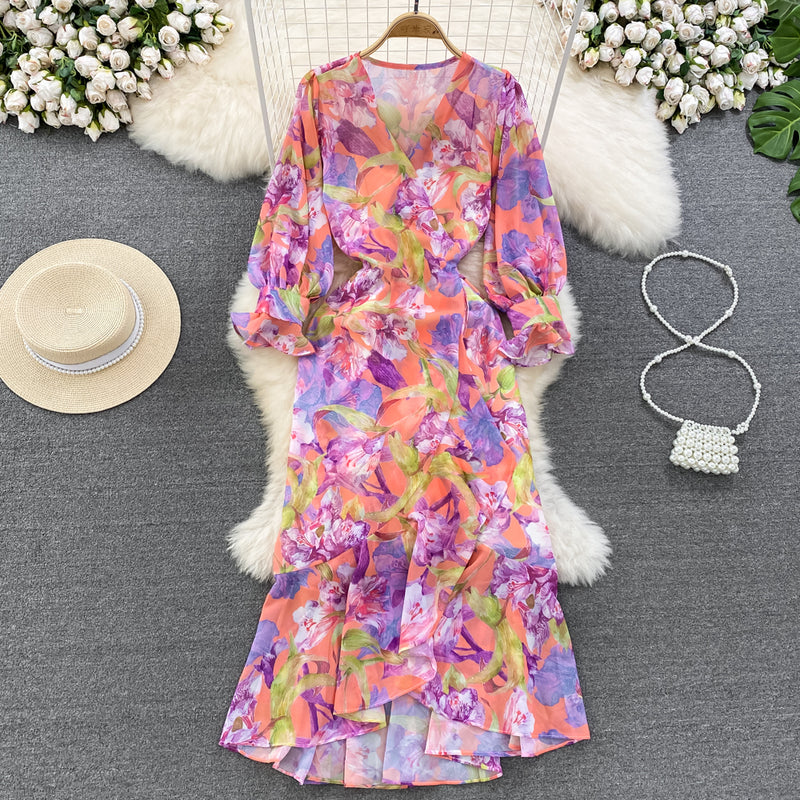 Rochie Gina portocalie cu decolteu in V si imprimeu floral
