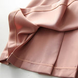 Rochie Darah roz cu pliuri la spate si guler accesorizat cu pietre