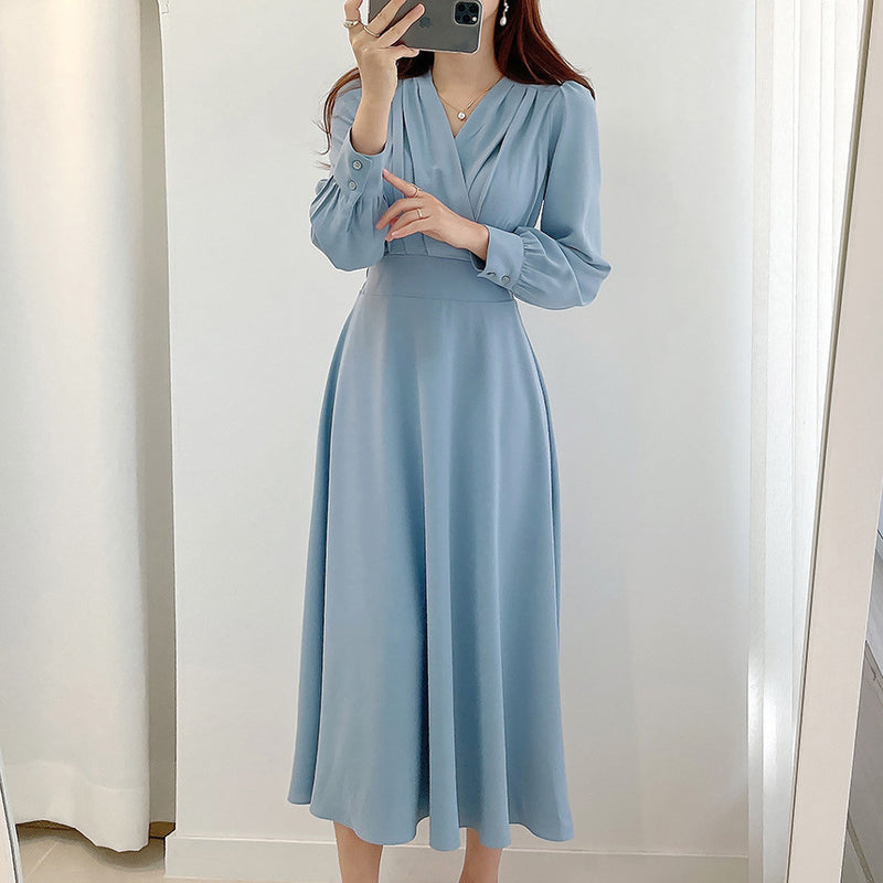 Rochie midi Fosetta albastra cu decolteu petrecut