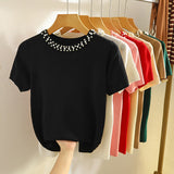 Tricou Zalys cu guler rotund decorat cu perle