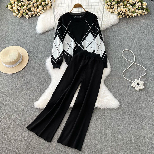 Compleu Sarina negru compus din bluza si pantaloni din tricot