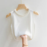 Top Kaelis din tricot cu perle la baza decolteului