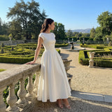 Rochie midi Christinne cu croi evazat si decolteu la spate