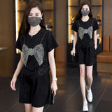 Set Bedia compus din tricou si pantaloni scurti cu pietricele