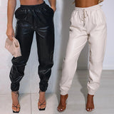 Pantaloni Bilga albi din imitatie de piele cu buzunare si talie elastica
