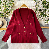 Compleu Emyra din tricot compus din jerseu si pantaloni