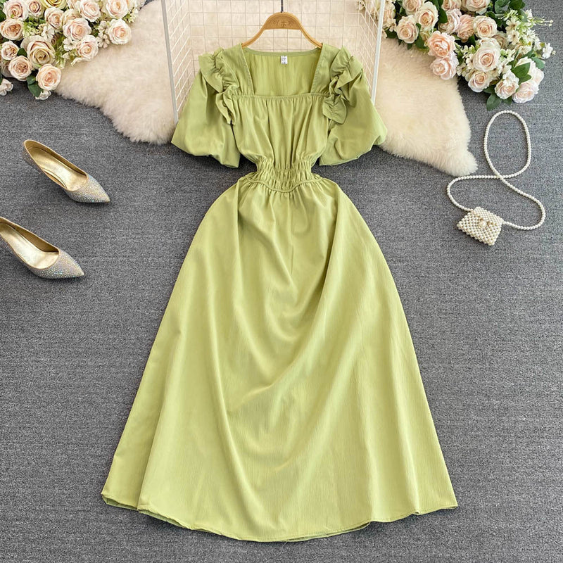 Rochie Emmana verde deschis cu decolteu patrat si maneci bufante