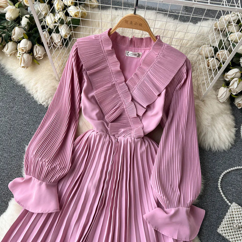 Rochie Nicolette roz plisata cu volanase la mansete