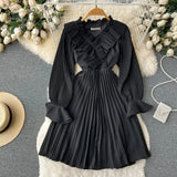 Rochie Nicolette neagra plisata cu volanase la mansete