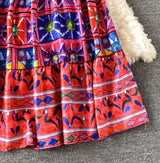 Rochie Cordelia rosie cu imprimeu deosebit brodat si bretele reglabile