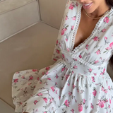 Rochie Lorela rosie cu imprimeu floral si detalii din dantela