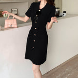 Rochie Evania neagra cu brosa tip funda si nasturi metalici