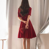 Rochie Essil rosie cu maneci scurte si cordon la spate