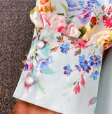 Rochie Danarys albastra cu imprimeu floral si curea accesorizata