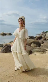 Rochie midi Aylora cu volanase si decolteu adanc