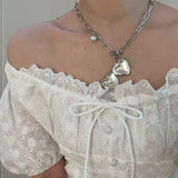 Colier argintiu cu perla si pandantiv in forma de  inima
