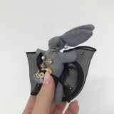 Elastic de par cu figurina in forma de iepuras din material textil si detalii din perle