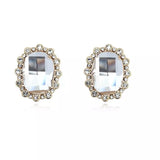 Cercei cu element de cristal si pietre strass