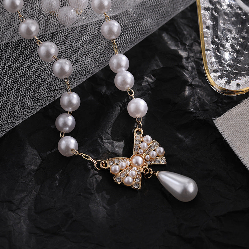 Cercei sau colier cu funda, perle si strassuri, ace de argint S925
