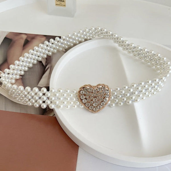 Curea elastica din perle cu catarama in forma de inima din cristale incrustate