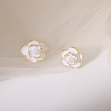 Cercei eleganti in forma de floare  alba, ace de argint S925