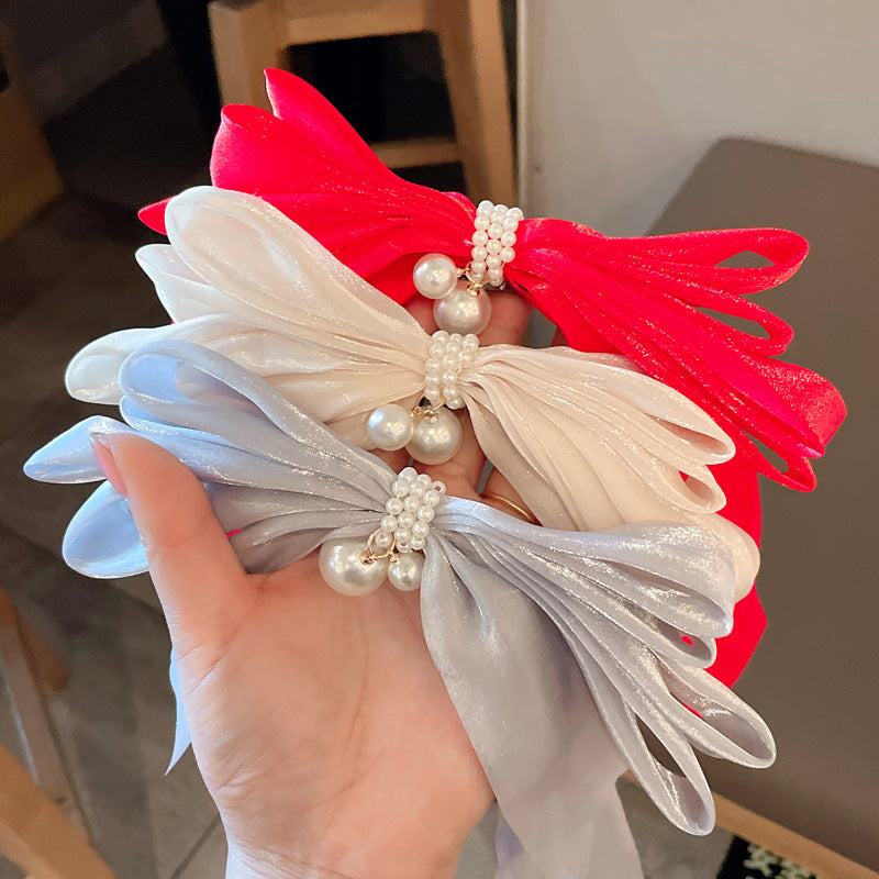 Clama de par tip funda cu perle in mijloc