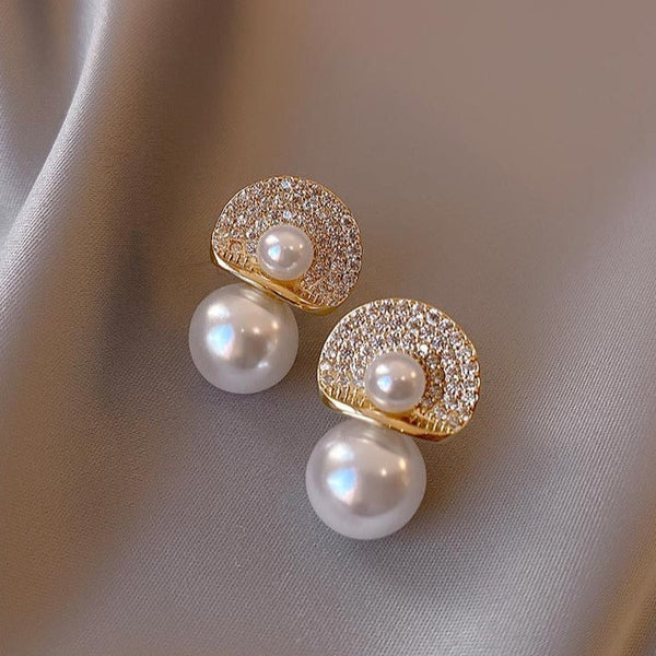 Cercei cu perle si pietre incrustate in forma de semicerc