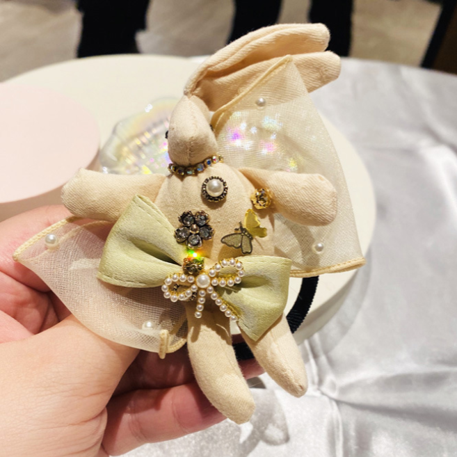 Elastic de par cu figurina in forma de iepuras din material textil si detalii din perle