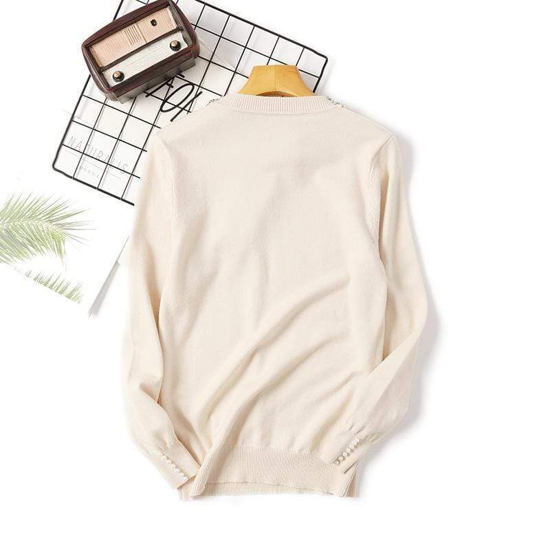 Pulover Rosemary crem din tricot moale cu decolteu si mansete accesorizate cu perle