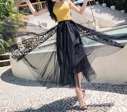 Fusta Camille neagra midi din tulle moale cu elastic accesorizat cu funda in talie si insertii de dantela