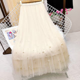 Fusta Perllis crem din tulle accesorizata cu perle