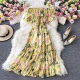 Rochie Damiana galbena cu imprimeu floral, decolteu tip barcuta si elastic in talie