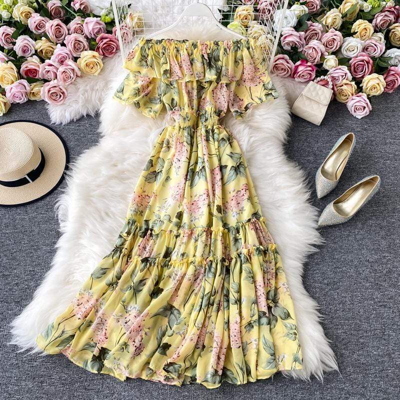 Rochie Damiana galbena cu imprimeu floral, decolteu tip barcuta si elastic in talie