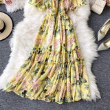 Rochie Damiana galbena cu imprimeu floral, decolteu tip barcuta si elastic in talie