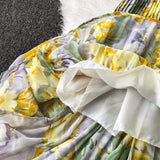 Rochie Debbye galbena plisata cu elastic in talie, imprimeu floral si decolteu in V accesorizat cu nod