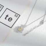 Lantisor cu pandantiv dreptunghiular si cristal galben